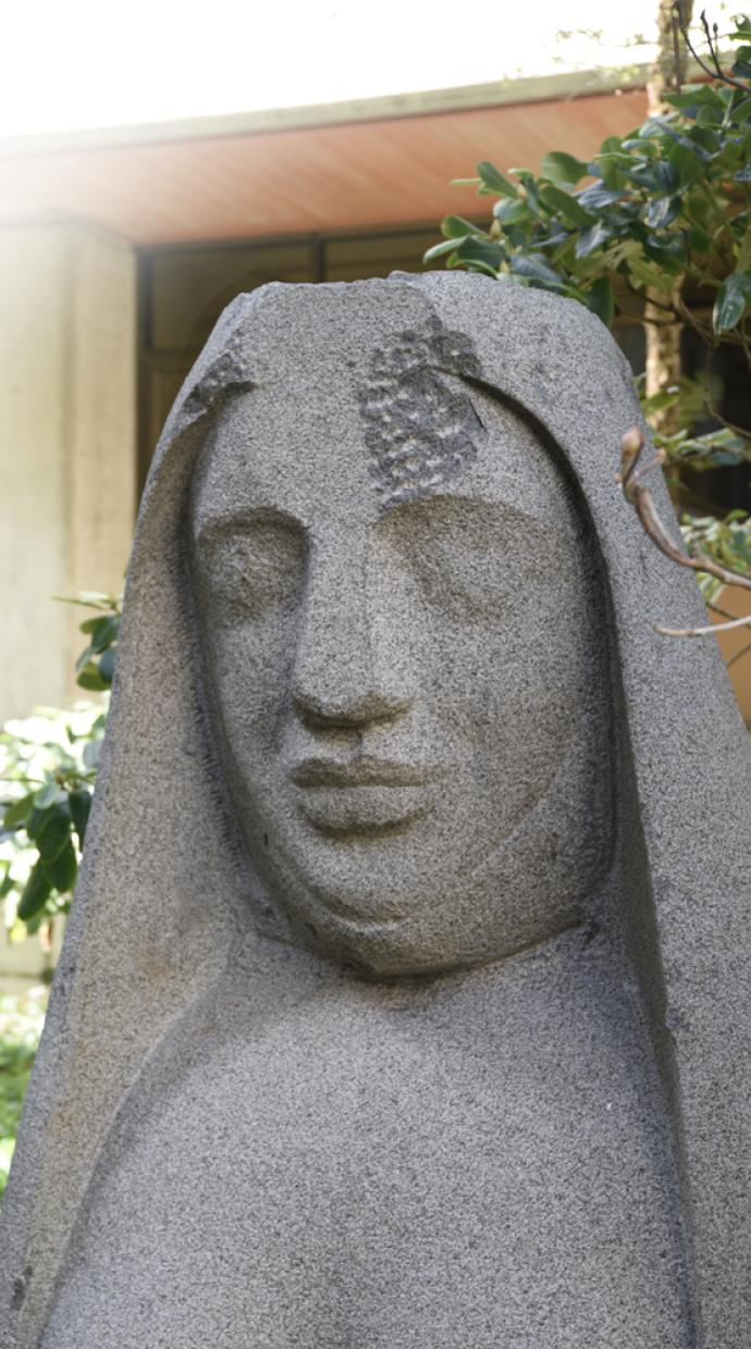 A nun sculpture.